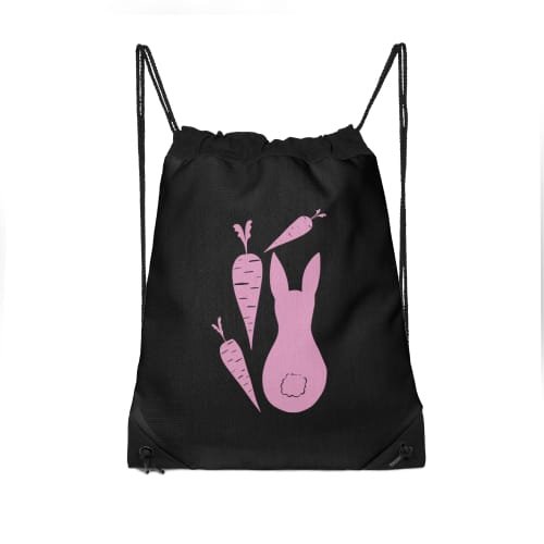 Mockup of a drawstring bag with a minimalist drawing of a pink bunny with pink carrots around it on a black background
