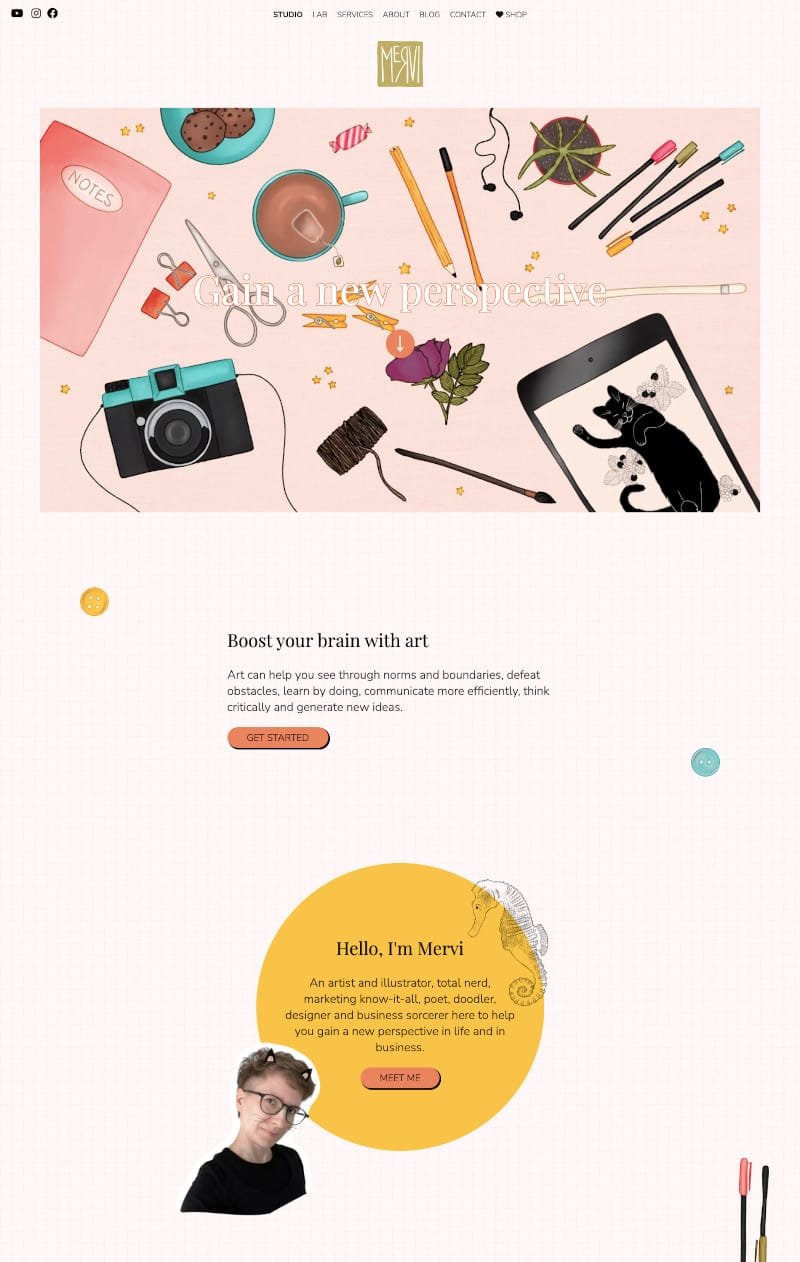 A screenshot of the top part of the redesigned front page, featuring text and illustrations, such as What's On My Desk, colourful buttons, a black line drawing seahorse and colourful marker pens, plus a photo of me with doodled cat ears and whiskers on it